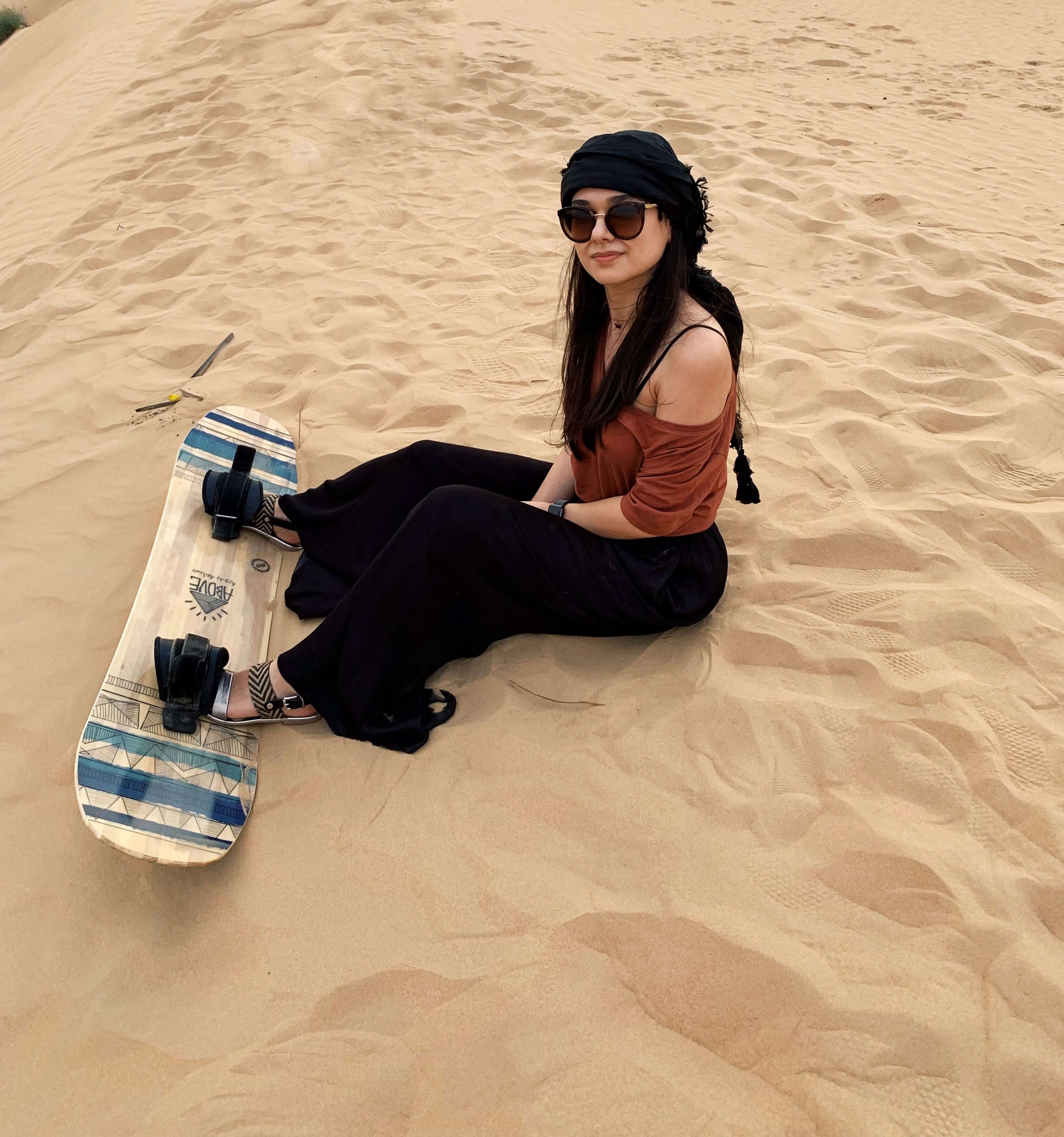 Dubai desert safari sandboarding